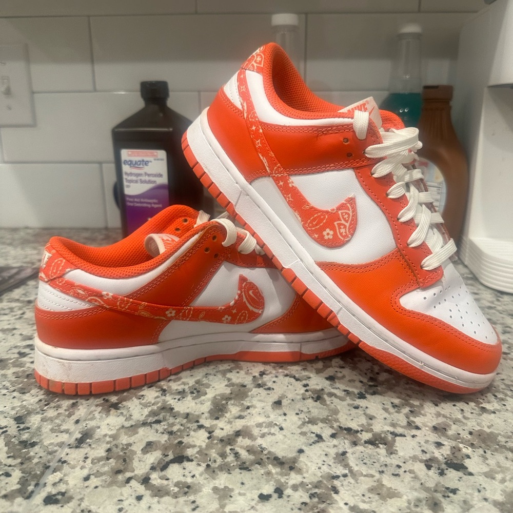 Nike Orange and White Sneakers with Classic Dunk Design